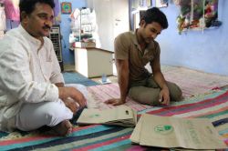 Asgar Ali and Mohammed Sharif at home  with kota doria paper bags